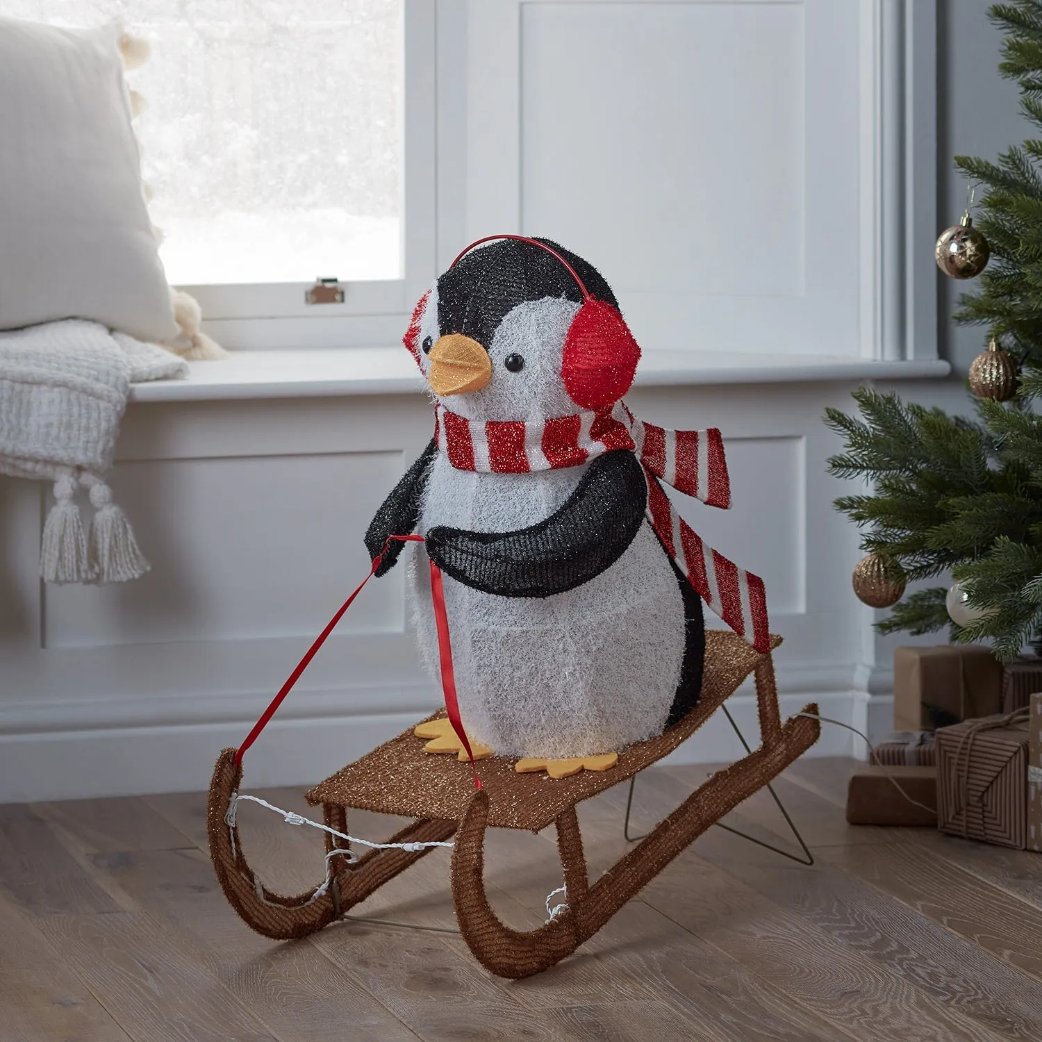 66cm Sledging Penguin Christmas Figure